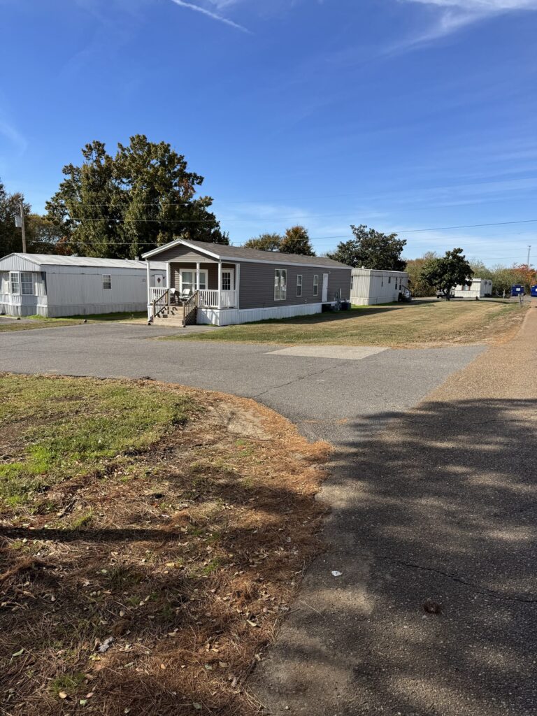 Community street of homes at Candlelite Mobile Estates in Olive Branch, MS